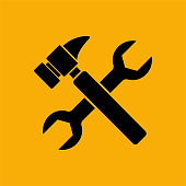 istock Hammer and wrench icon on yellow background. 1444194433