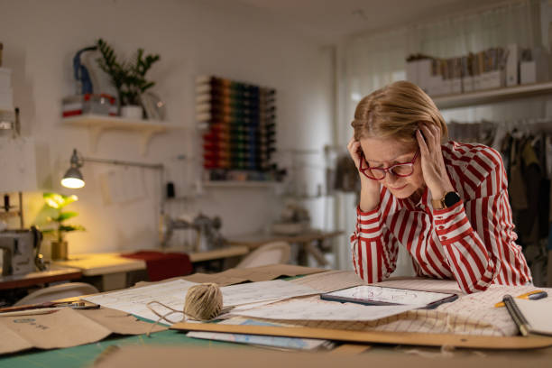 istock Female clothes designer struggling with creativity 1444195104