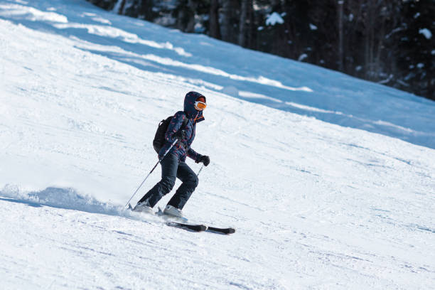 istock Female skier on the slope 1444196956