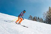 Young skier on the piste