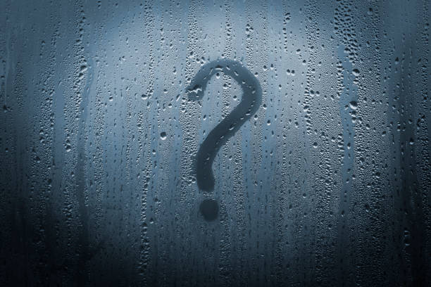 a question mark on a fogged window, a question mark drawn on a window with a finger