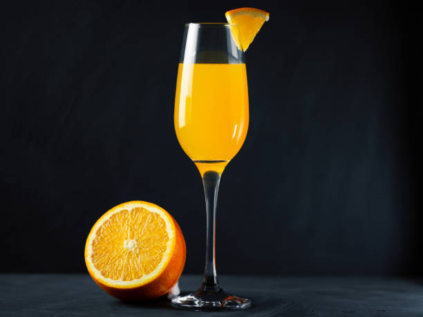istock Mimosa cocktail on a black background 1444204442