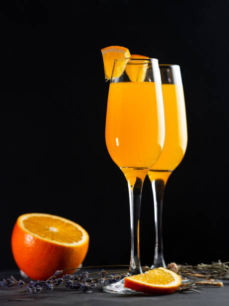 istock Mimosa cocktail on a black background 1444204443