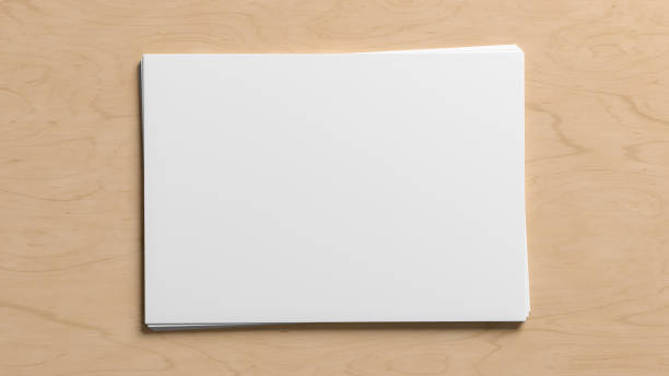 istock Stack of paper mockup on the wooden table 1444205501