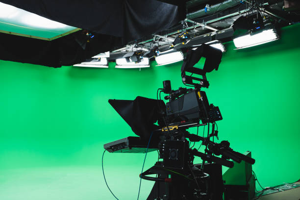 Professional green box tv studio. Prompter camera and studio lights ready for TV show. Tv industry. Chroma Key, Studio Shot, Studio - Workplace, Cyclorama - Backdrop, Backgrounds stage set stock pictures, royalty-free photos & images