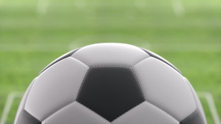 Soccer ball on stadium field