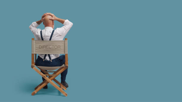 istock Desperate film director with head in hands 1444212960