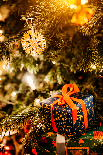 traditional christmas decoration and gifts under the tree on Christmas Day