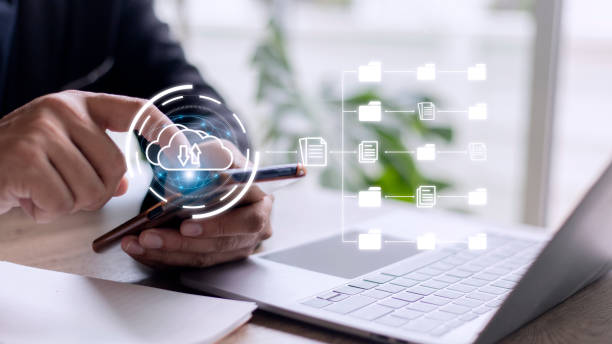 istock Document in folder to manage a hybrid cloud system and download or upload data to cloud computing. document management concept. 1444213793