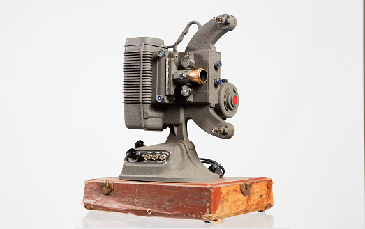 Old movie film projector isolated with clipping path.