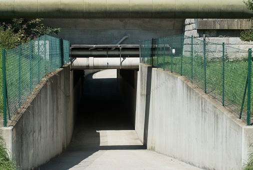 a subsurface route or underpass in road traffic and transportation