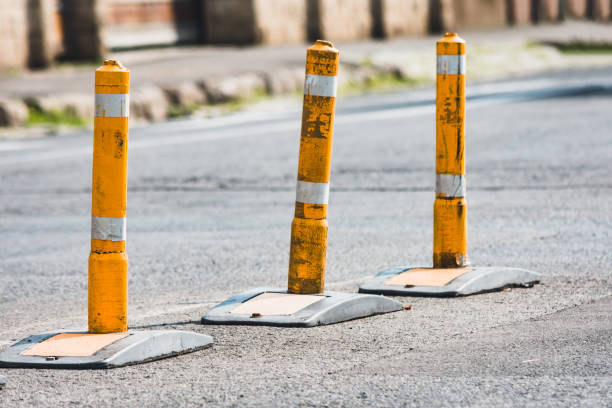 istock Yellow bollards on the road to split lanes 1444228386