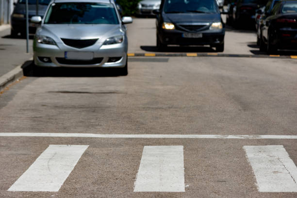 istock Cars in front o f a crosswalk 1444228433
