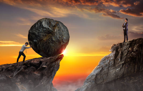 istock Business man pushing large stone, Business heavy tasks and problems concept. 1444230266