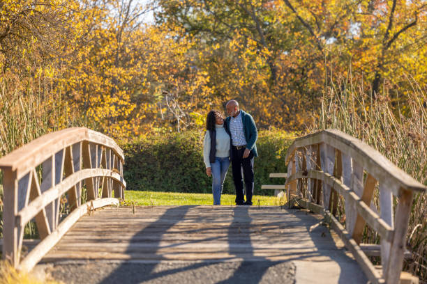 istock Couple in a Gorgeous Park 1444231996