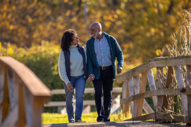 istock Couple in a Gorgeous Park 1444231997