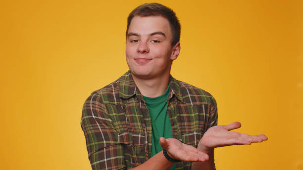 istock Man raising hands asking what why reason of failure demonstrating disbelief irritation by troubles 1444248063