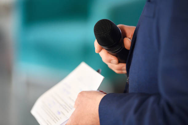 istock Host is getting ready to make an announcement 1444248378