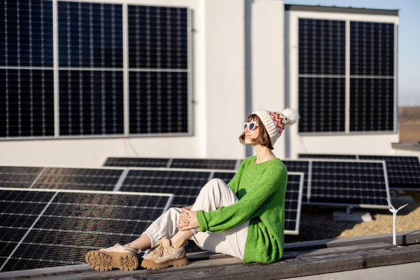 istock Happy house owner with a solar plant 1444248579