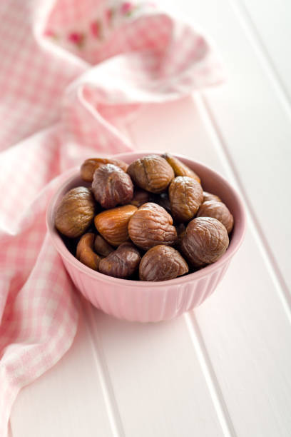 istock Peeled chestnuts. Sweet roasted chestnuts in bowl. 1444254855