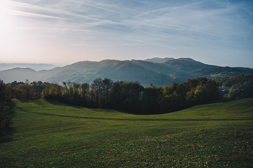 Misty summer mountain hills landscape. Countryside stock photos with misty hills.