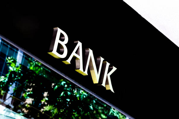 istock Closeup sign BANK on building, background with copy space 1444260643