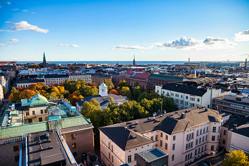Aerial scenery panoramic view city of Helsinki with buildings, capital of Finland at blue evening sky backgrounds. Amazing urban scenery view of Scandinavian finnish architecture. Copy text space