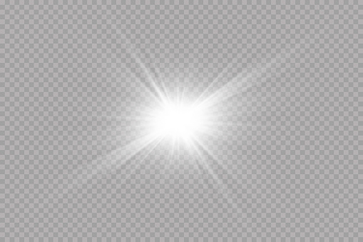 White sparkles.Bright star.Glow burst.Rays of the sun on a transparent background