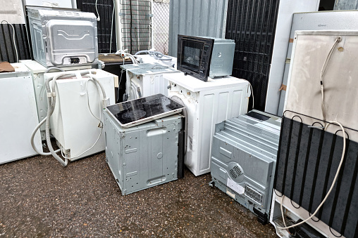 Electronic waste - refrigerators, washing machines and other household appliances - are ready for disposal.