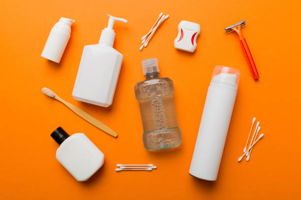 istock Mockup for bathing products top view flat lay, spa razor, toothpaste, soap, gel and other various accessories. Cosmetics for skin health. Bath Mockup for your logo 1444283088