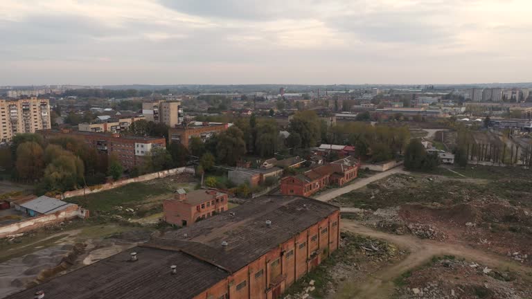 Small gray old city town 4k aerial view top in autumn. Ukraine building house