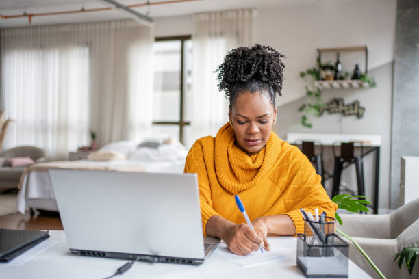 istock Black woman working from home office 1444291447