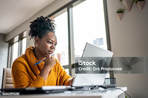 istock Black woman working from home office 1444291518