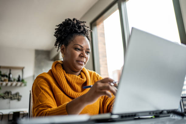 istock Black woman working from home office 1444291522