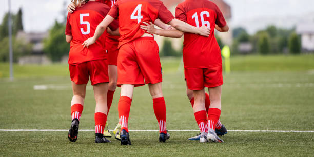 istock Red women's soccer team 1444291708