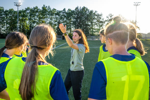 istock Women's soccer team are taking instruction from team coach 1444291725