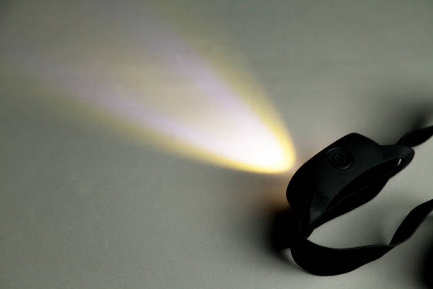 istock Head lamp in the black background 1444305151
