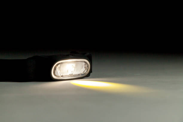 istock Head lamp in the black background 1444305161