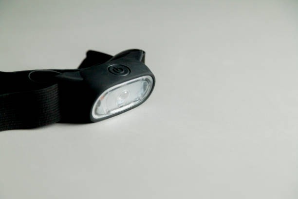 istock Head lamp in the black background 1444305182