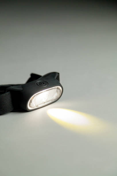 istock Head lamp in the black background 1444305196