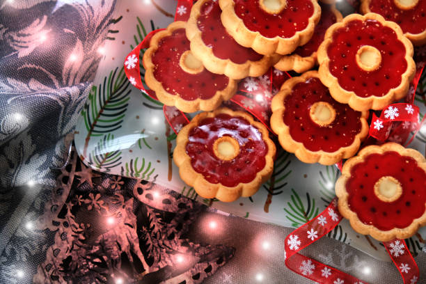 Festive Santa and Mrs. Claus cookies displayed on a wooden board, surrounded by Christmas décor. Perfect for holiday baking themes, seasonal ads, and cheerful Christmas promotions.
