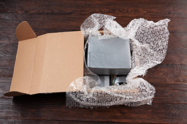 istock Hand made bomb with c4 and cell phone module in a cardboard box 1444320437
