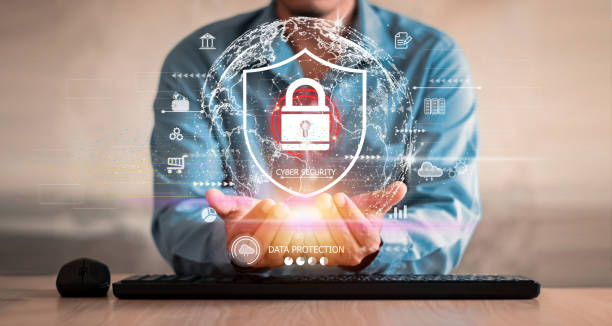 istock Businessman holding shield protect icon. Protection network security computer and safe your data concept, lock symbol, concept about security, cybersecurity and protection against dangers. 1444327623