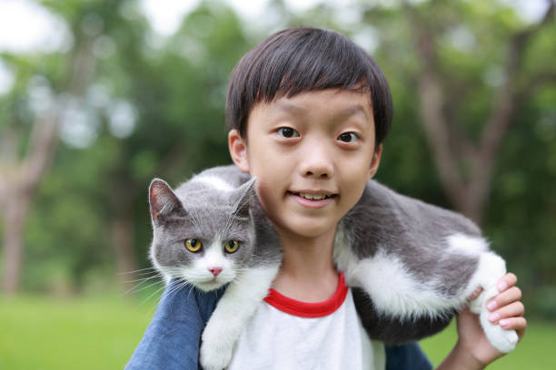 istock Little boy and his cat 1444327795