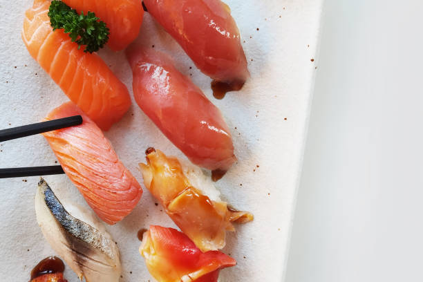 istock Closeup of fresh sushi on ceramic dish 1444328744