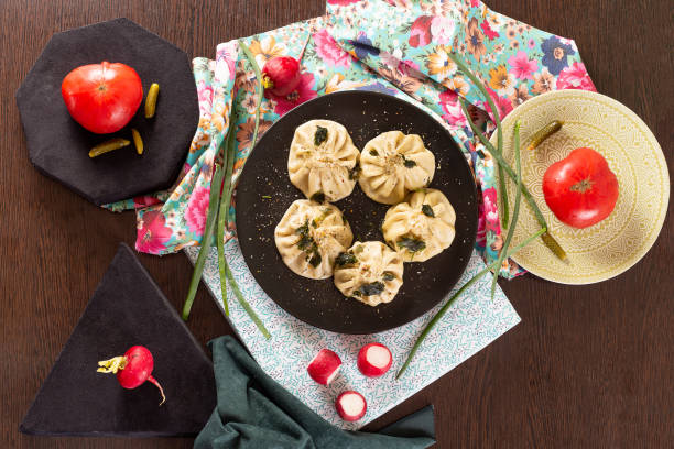 istock Georgian cuisine, boiled khinkali on a plate 1444343681