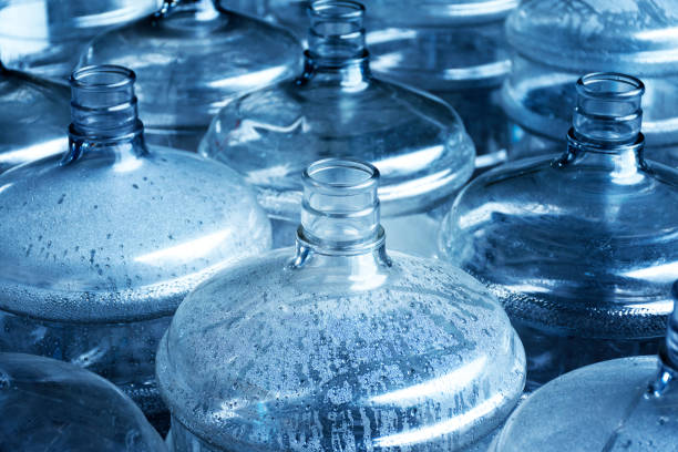 istock Pattern of 19 liter gallon plastic water bottle 1444343788