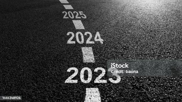 New Year 2023 2024 And 2025 On Asphalt Road Stock Photo - Download Image Now - 2025, Road, 2024
