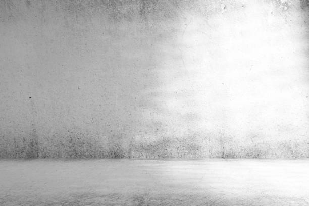 istock Abstract White Concrete Room Background with Beautiful Light Leak, for Product Presentation Backdrop and Mockup. 1444350063