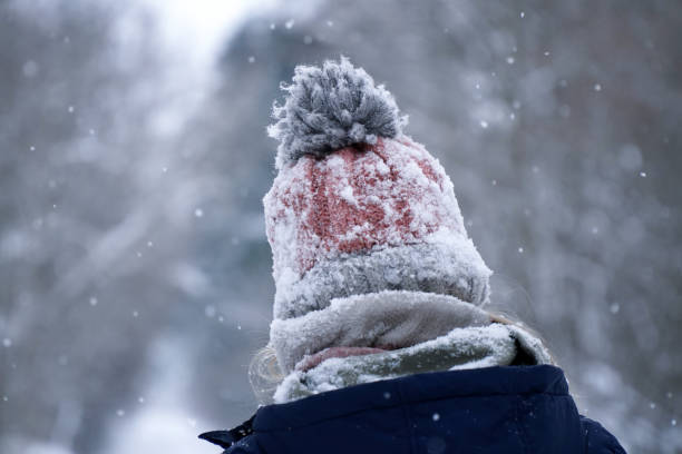 istock A child in a winter hat. Winter snow. Baby's head 1444351585